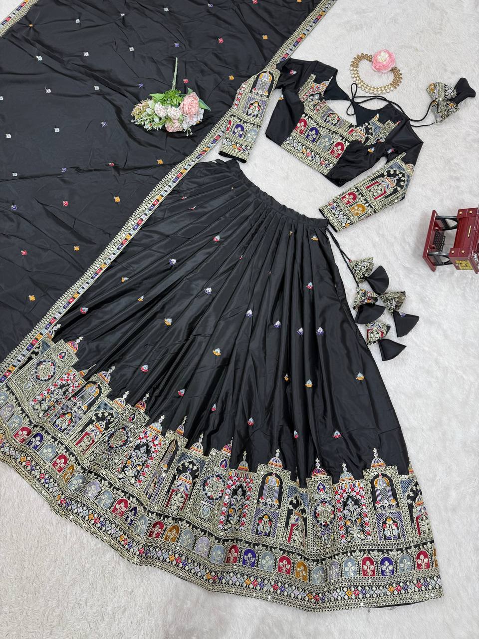 Majestic Midnight Black Designer Lehenga Choli Featuring Intricate Multicolored Architectural Embroidery and Mirror Work